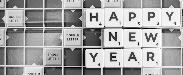 Happy New Year written with Scrabble tiles